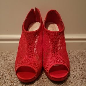 Bright red peep toe bootie heels
